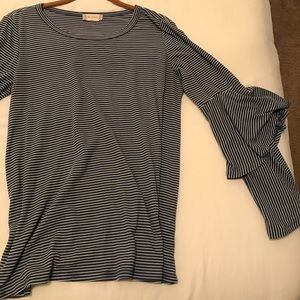 Long sleeve statement sleeve shirt.